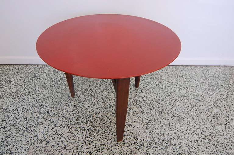 Scarce Brown Saltman round table with red top. Tag on bottom. Very nice mid-century modern design.