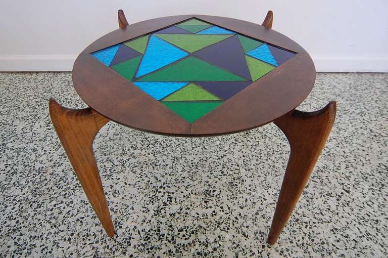 Unique mid-century mosaic round end table with sculptural legs. Made of walnut wood.