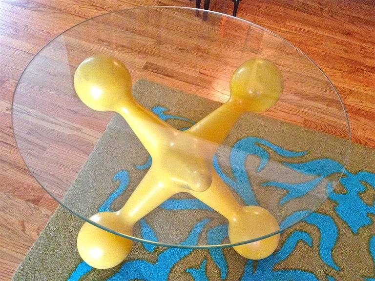 Rarely seen Bill Curry for Design Line table. Yellow jack is plastic mold with glass top. 