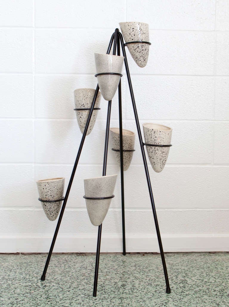 Amazing ceramic planter with metal base. 7 total ceramic planters.