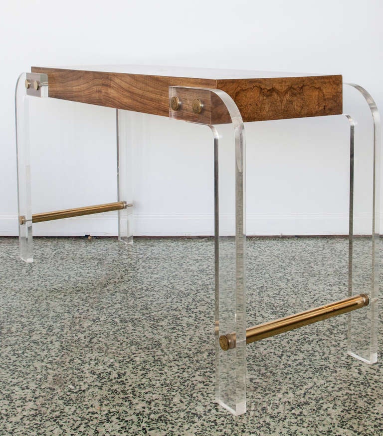 Very nice Lucite and burlwood console coffee table. Nice wood top with curved Lucite legs and metal rod.