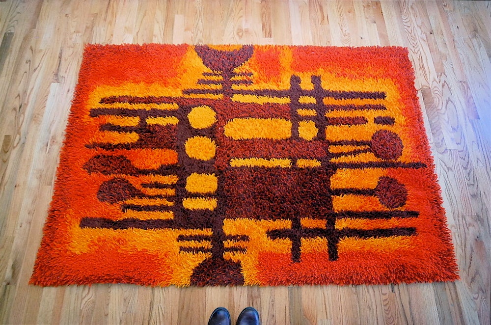 Artistic long pile rya rug by Danish maker Van Guard Ege. Vibrant geometric pattern with orange and red background.  Great condition.