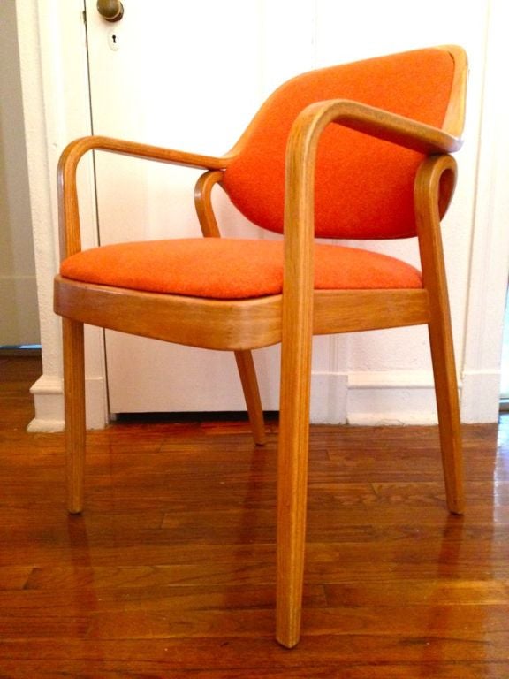 Pair of bent wood arm chars by Don Pettit for Knoll. Two lengths of pressed and bent layers of sculpted wood make up the legs and arms as well as the seat back frame. 

New Knoll fabric, frames should be refinished.