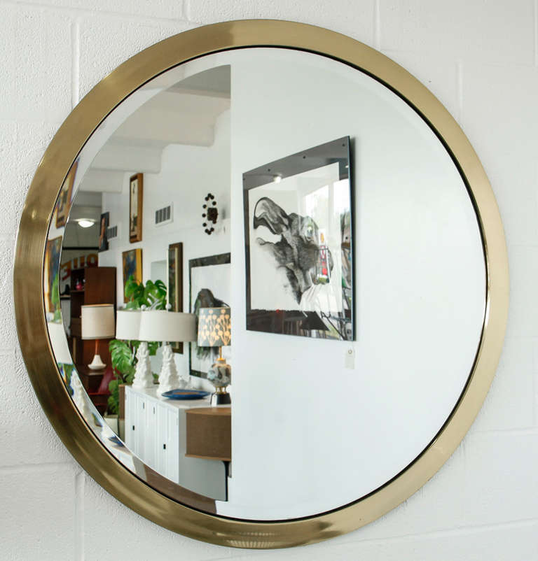 Round Beveled Mirror In Brass Frame. Baughman / Jere style

the diameter of this mirror is 41