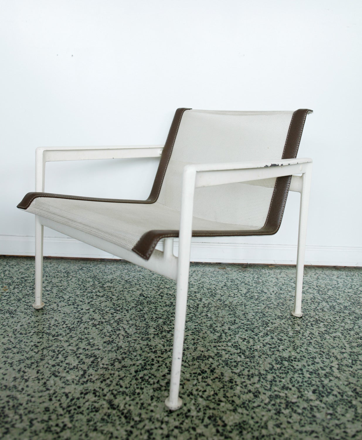 This set of 1966-45 armchairs are part of the collection that Richard Schultz designed in 1966 at the request of Florence Knoll, who wanted well-designed outdoor furnishings that would withstand the corrosive salt air at her home in Florida. White