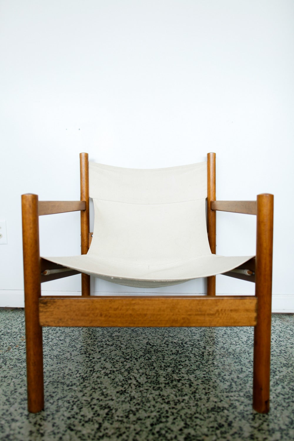 Nice and Classic sling lounge chairs by Michel Arnold safari chairs. Canvas upholstery with beautiful teak frame.