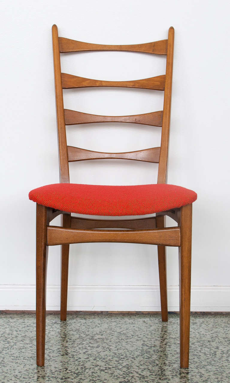 Very nice set of 6 danish modern ladder back dining chairs in newer upholstery. Overall very nice condition.