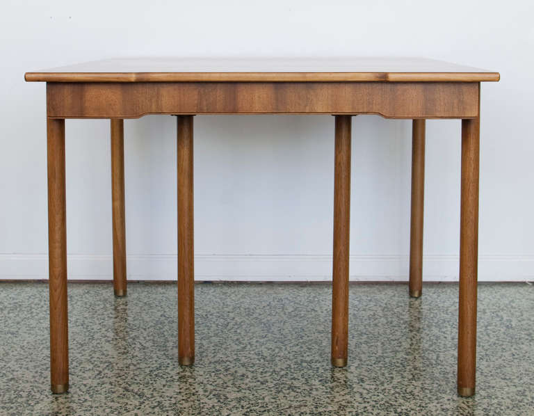 Widdicomb dining table by John Widdicomb. Four dining chairs also available.