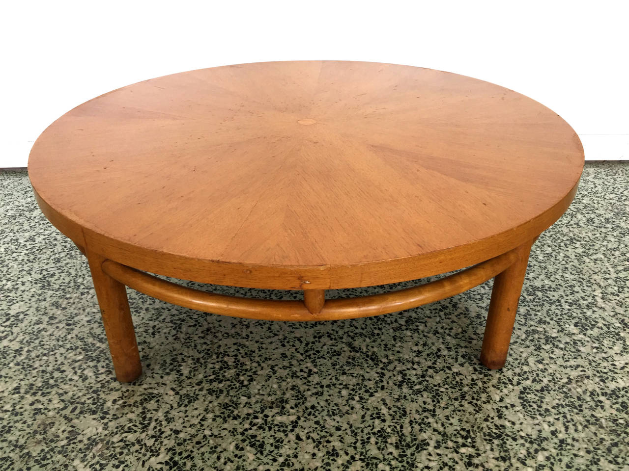 Walnut stain solid maple round coffee table with sound top, label under.
