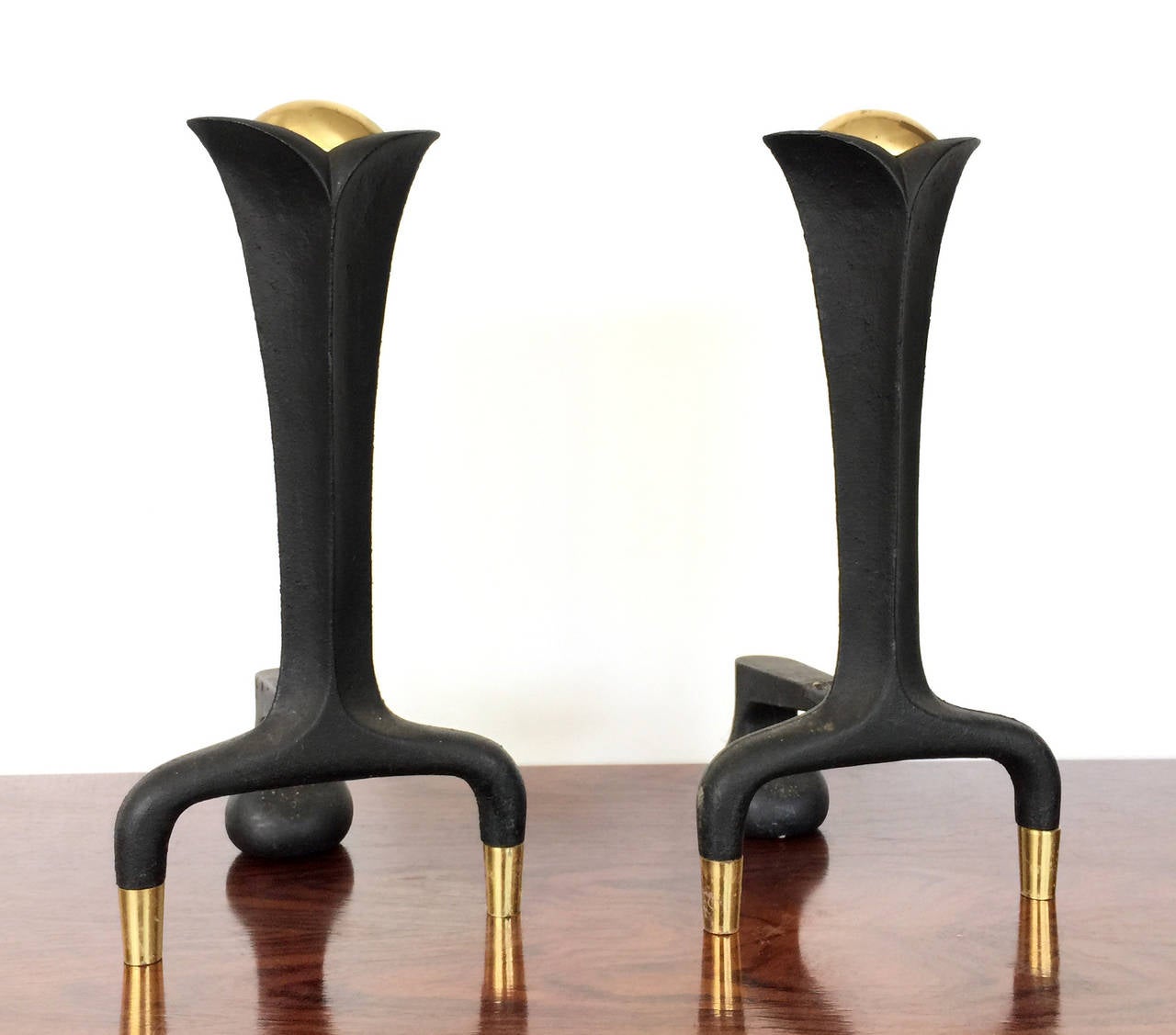 Very impressive black and gold Mid-Century Modern fireplace andirons designed by Donald Deskey for Ward Bennett.
