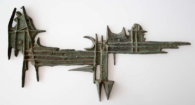 Beautiful cast mixed metal wall sculpture.    Appears to be a bridge and cityscape.   Unsigned, but purchased from the Harvey Mueller estate.