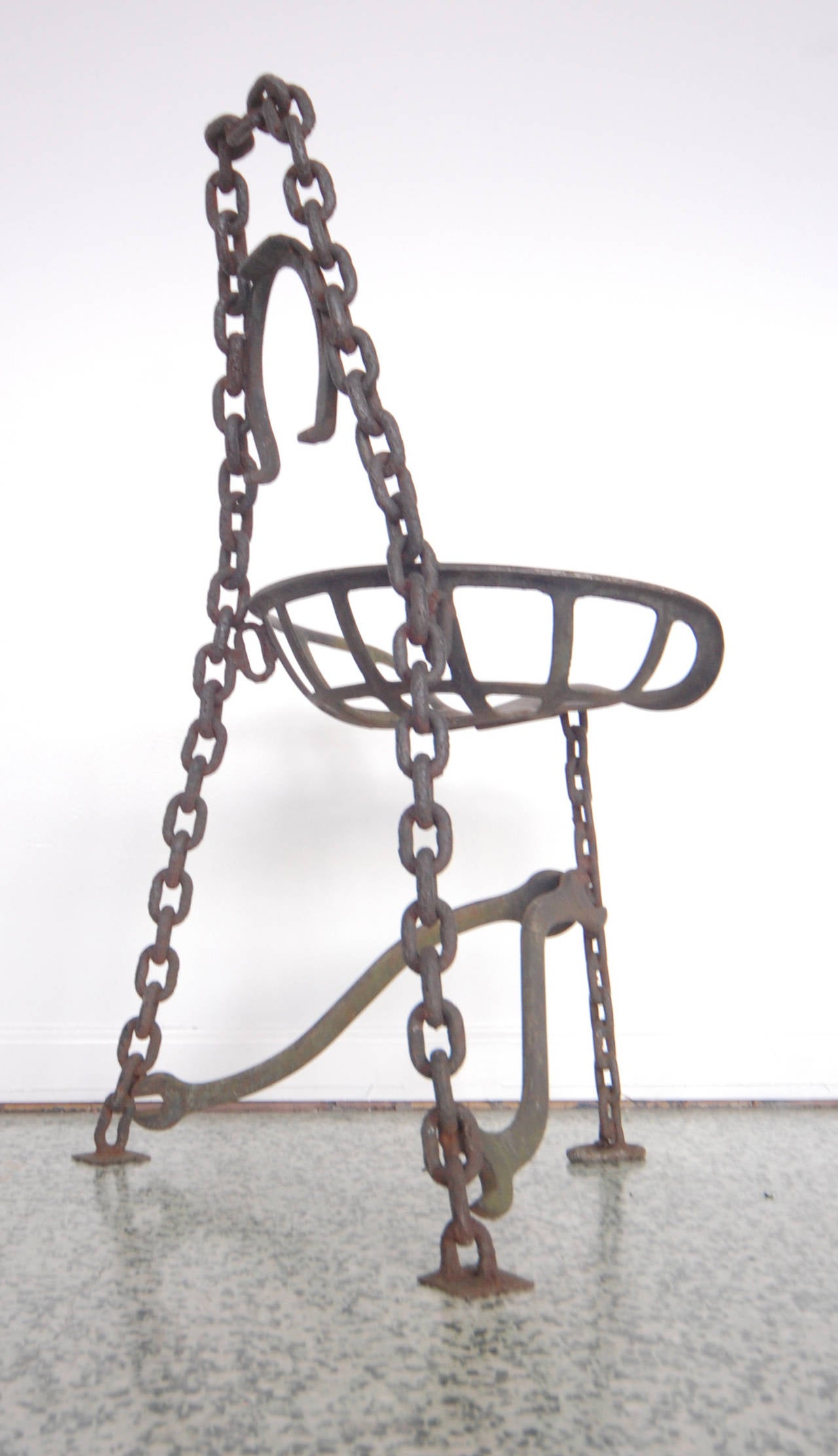 Lucky horseshoe metal folk art chair. Made with wrenches, tractor seat and hoseshoes.