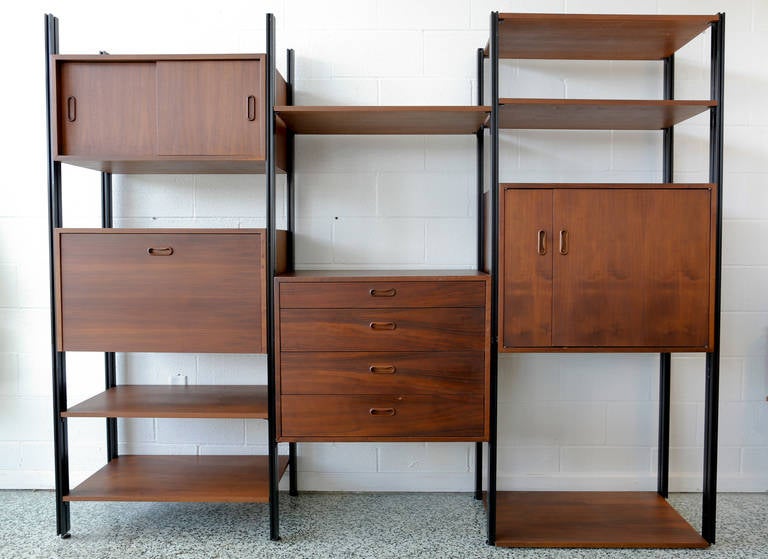 George Nelson for Omni free standing wall unit. This unit consists of rare reel to reel unit, six shelves and four storage pieces.