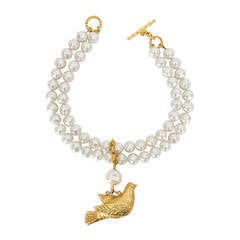 DOMINIQUE AURIENTIS Collier pendentif oiseau baroque à deux rangs en fausse perle