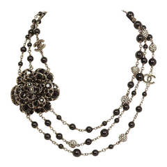 Chanel Black Three Strand Bead Necklace W/ Rhinestone Camelia