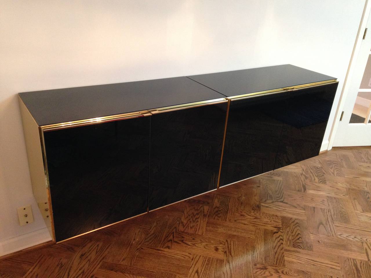Late 20th Century Floating Black and Gold Ello Credenza