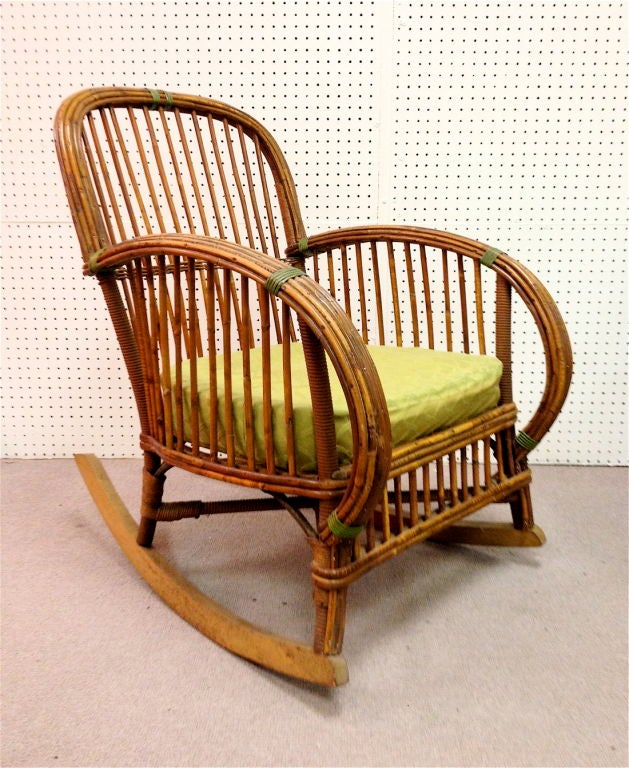 Beautiful 1920's Art Deco split reed Rocking Chair. We have matching lounge chair and sofa also available on 1stdibs.