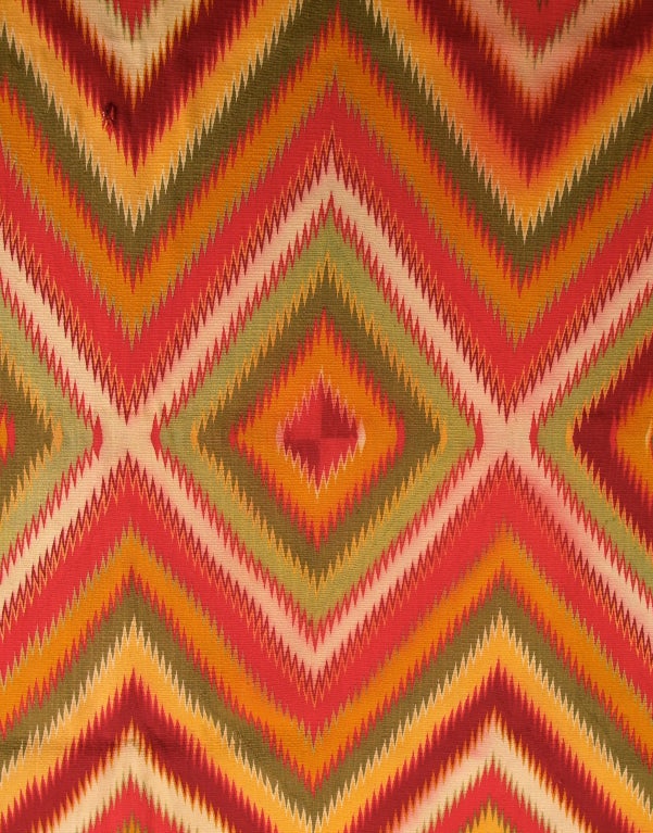 The Navajo had a long tradition of weaving dating to the early 19th century. With the intoduction of these brightly colored yarns from Germantown Pennsylvaina they started doing mugh more elaborate weavings influncenced bythe Saltio weavings coming