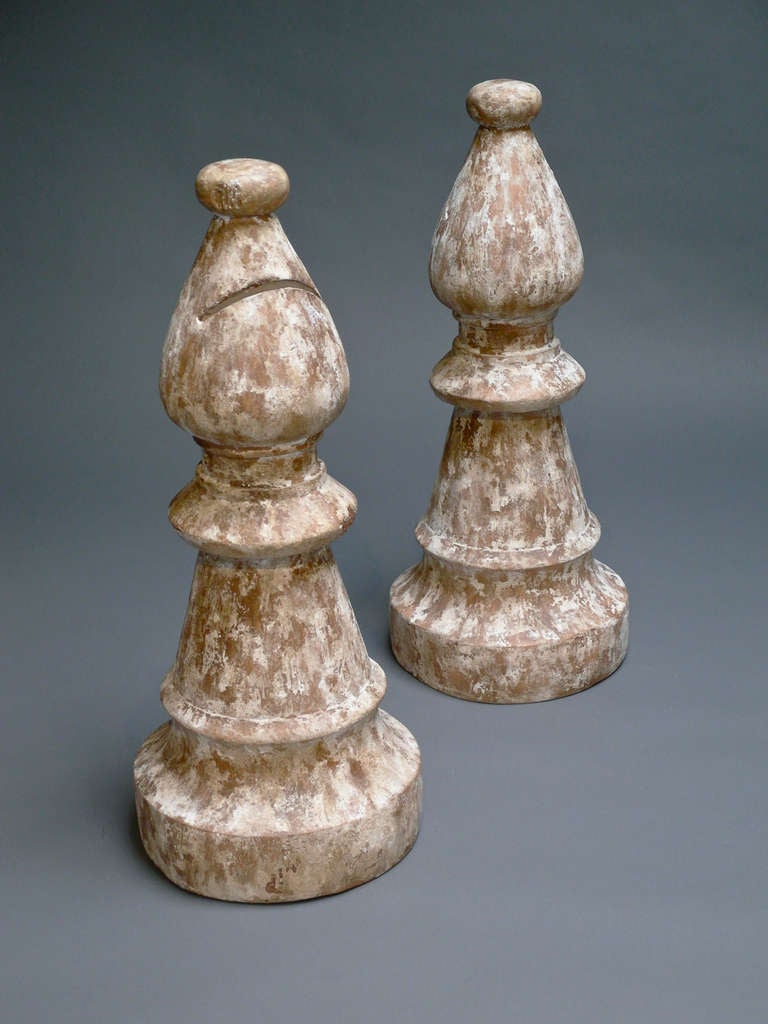 These chess pieces are cast in polyresin and faux painted to resemble weathered wood. These pieces are warehoused in Chicago.