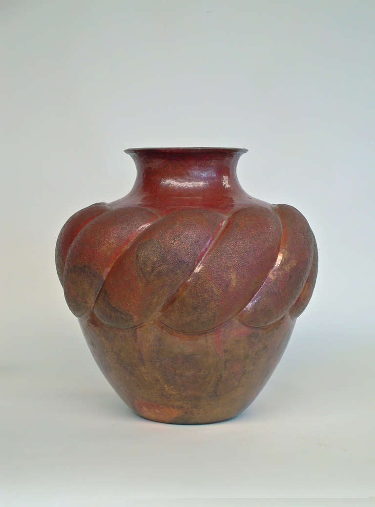 This large piece from Santa Clara del Cobre features a deep and rich patina