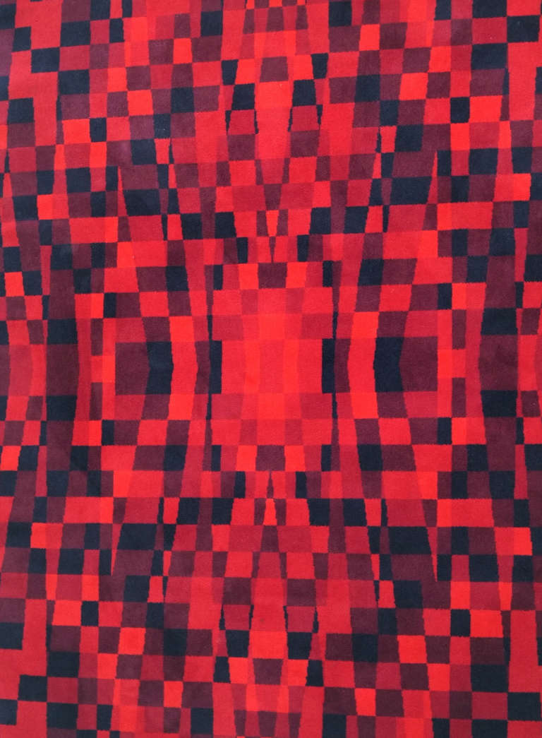 Verner Panton Is regarded as one of Denmark's most influential modern designers.His psychedelic signature style can be seen in many of his creations which range from lighting to carpets. This carpet has a Unika Vaev label.