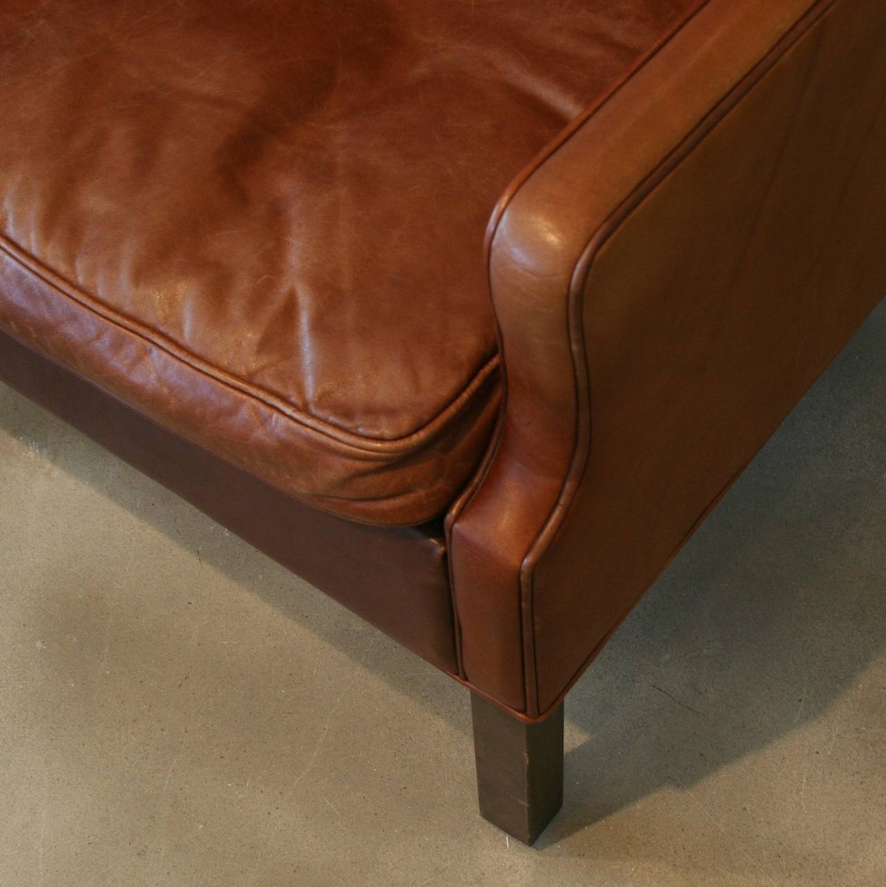 Vintage Danish Brown Leather Armchair and Ottoman In Excellent Condition In Vancouver, BC