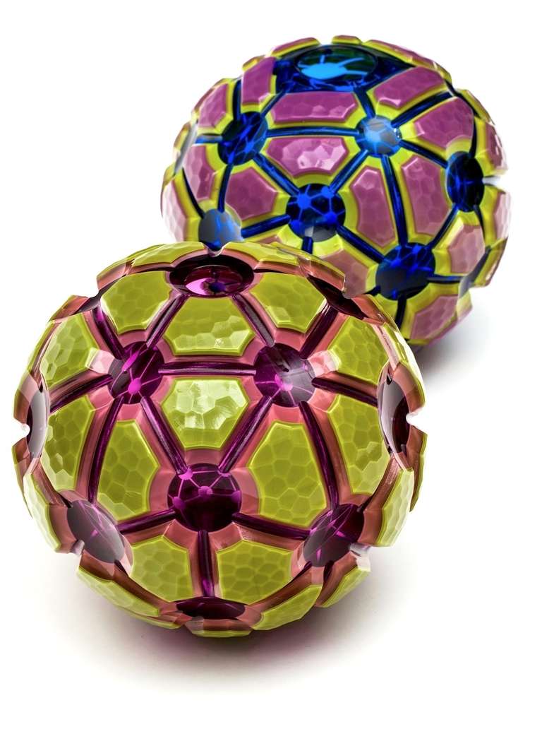 Sculptural glass vases by Robert Phillips called fractal orbs. Fabulous geometric vases with op art illusions created by a unique technique of hot shaping and cold working techniques with strict attention to detail. Working in both the us and