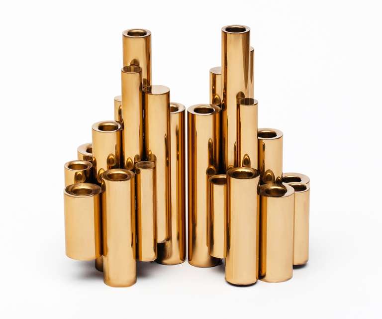 Fabulous Matched Pair of Brass Tubular Candlesticks in the manner of Gio Ponti. Sculptural they can be arranged in various ways to create a dramatic look.