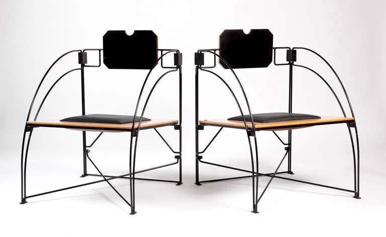 Fabulous designed prototype chairs with reversible seat cushions and head rests...Black/Natural and Brown/Black.    A striking design that is also comfortable. Unsigned. Chairs can also fold by removing the seats.