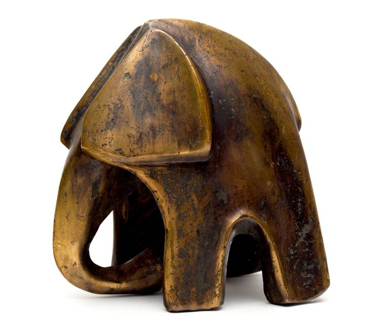 Fabulous abstract bronze sculpture of an elephant with mottled etching that is not only handsome but a heavy chunk of bronze. Signed 4/5 E on lower back leg.