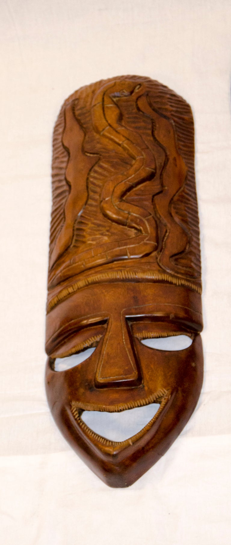 Tiki Masks collected for the Coral Reef restaurant in Sacramento, CA in the 1940's and 50's. Nice quality, hand carved.
Snake mask is 28