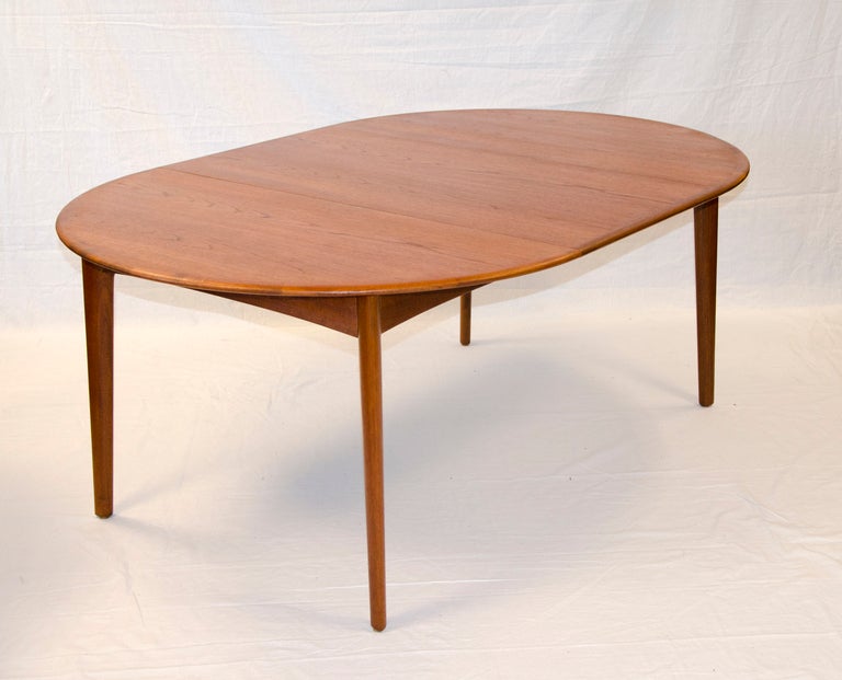 teak dining table round