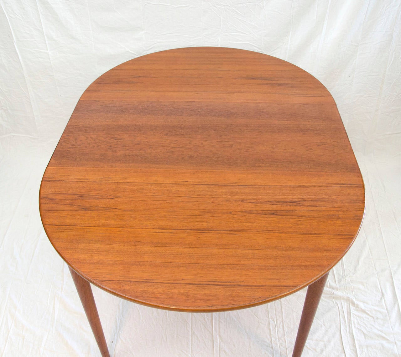 Mid-Century Modern Danish Round Teak Dining Table with Two Leaves by Moreddi