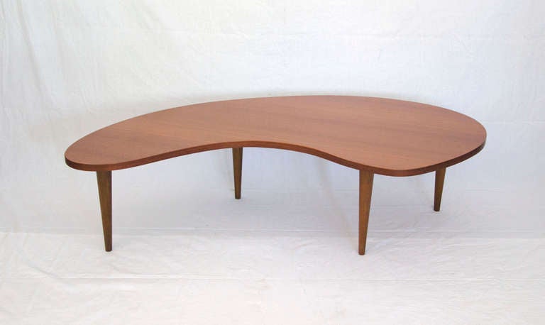 This amoeba free form shape table has been very well taken care of by one owner. Stamped 