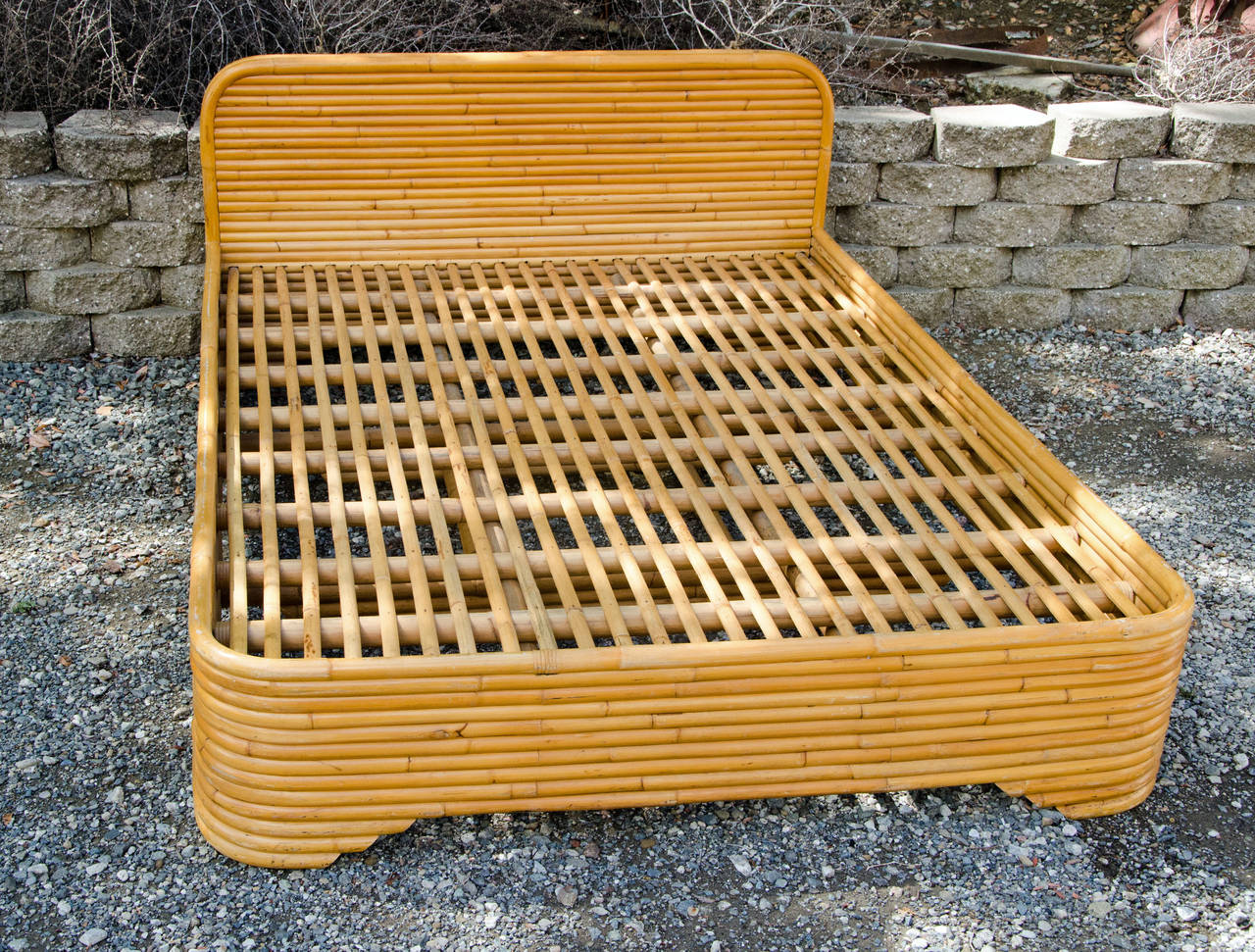 Hard to find rattan bed frame with headboard perfect for a tiki decor guest room or an interesting children's bedroom, Original finish.