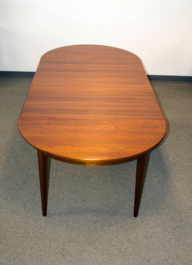 Nice quality round dining table. Three 19 3/4