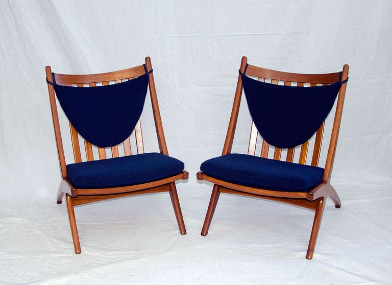 Danish teak armless lounge chair. Dark blue nubby upholstery. Very comfortable with small padded cushions against wood slat backs. Side view scissor design similar to Dux or Rissom.  Chair has no markings.
ONLY ONE CHAIR IS AVAILABLE.