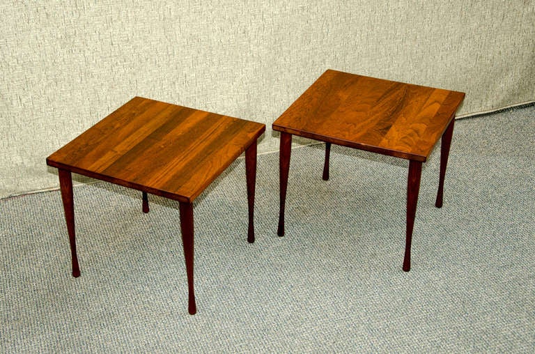 Nice small pair of square tables. They can be placed side by side for use as a small coffee table or easily moved in front of or beside lounge chairs for individual access. Light weight with solid teak top, also the legs are easily removable for