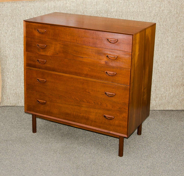 Beautiful chest of drawers designed by Peter Hvidt & Orla Molgaard-Nielson imported from Denmark by John Stewart NY. Typical Peter Hvidt construction with box joinery and inset drawer handles.