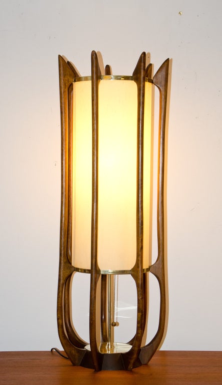 Nice design mid century Danish style table lamp with walnut framework, brass trim and original shade. Manufactured by Modeline.
 Shade is 24
