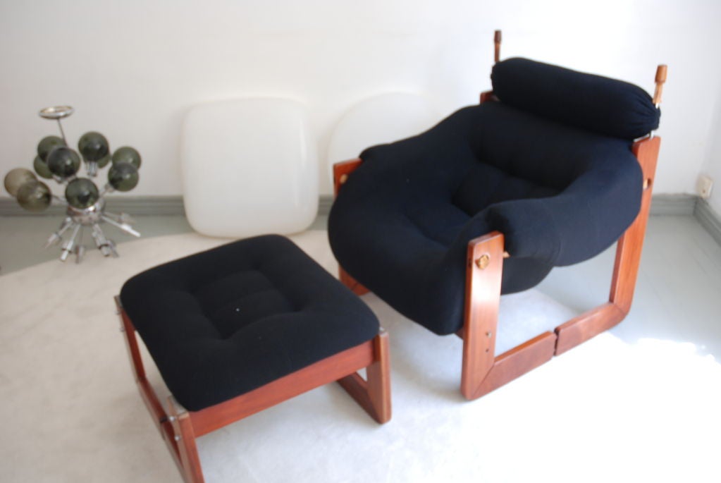 Sergio Rodrigues arm sofa and ottoman.