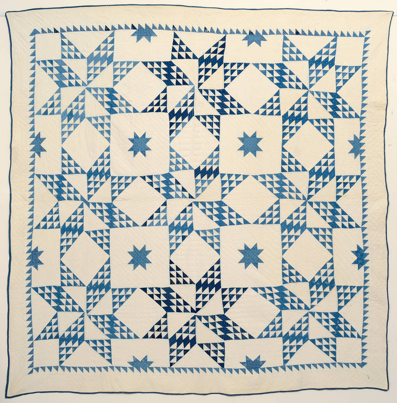 This version of touching stars is different from the more usual configuration of stars made of diamonds. In this quilt known as 