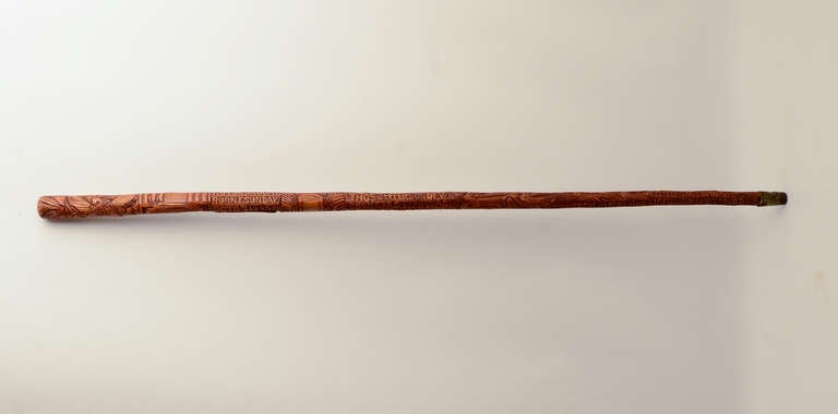 Unique carved cane that chronicles the life and achievements of Thomas Jefferson. Among the carved words are 