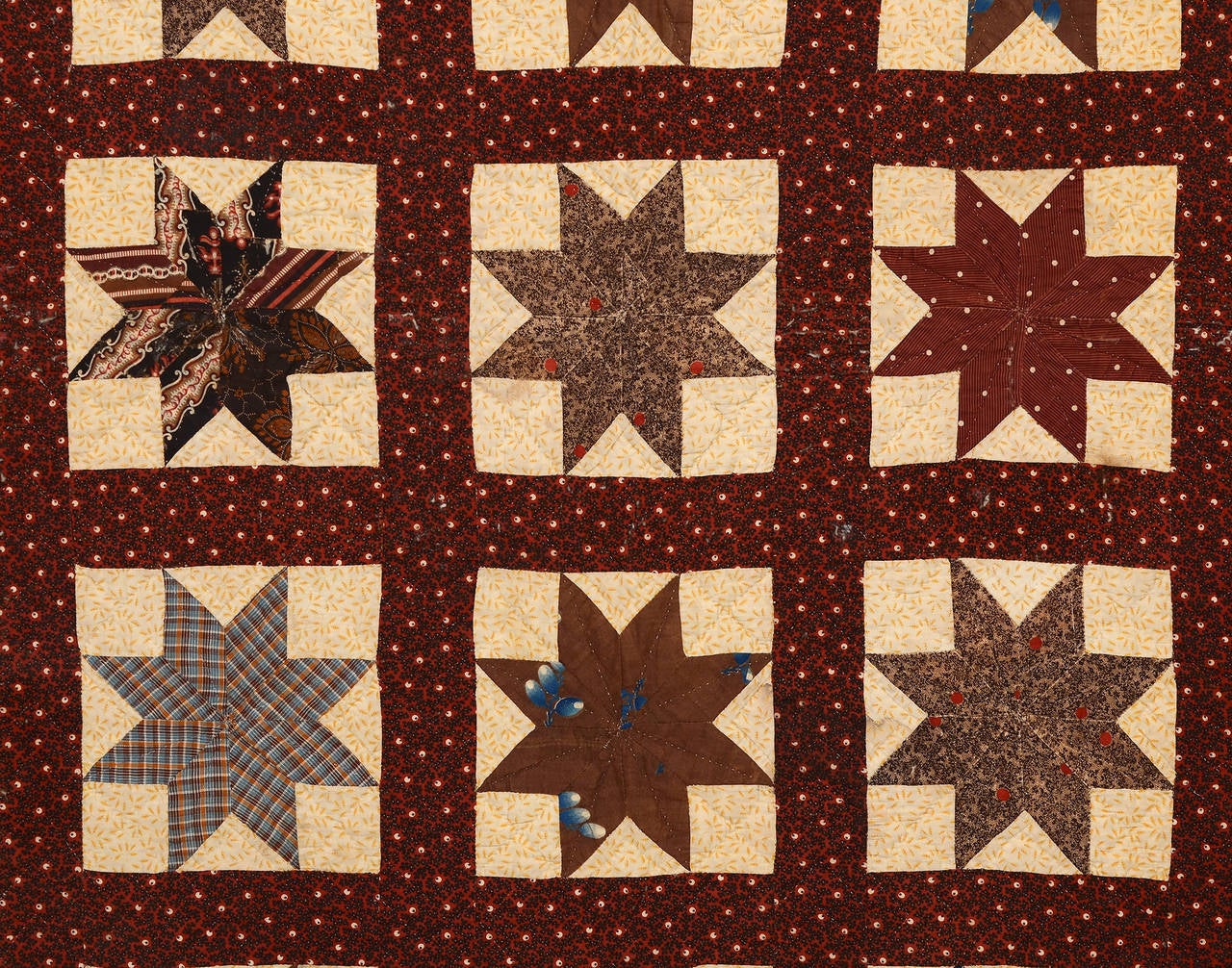 American Lemoyne Stars Quilt with Swag and Bow Border
