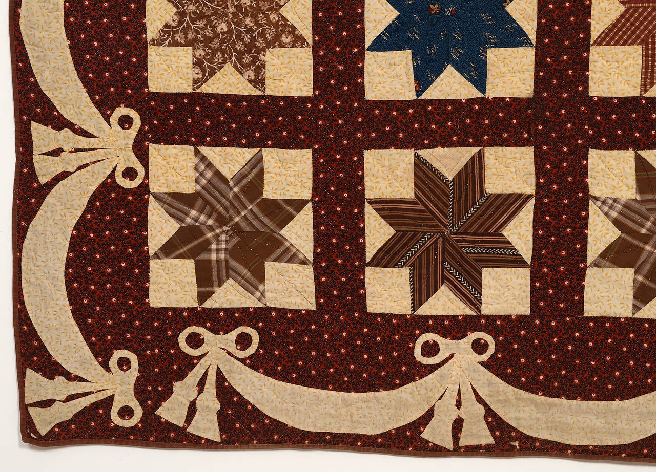 Mid-19th Century Lemoyne Stars Quilt with Swag and Bow Border