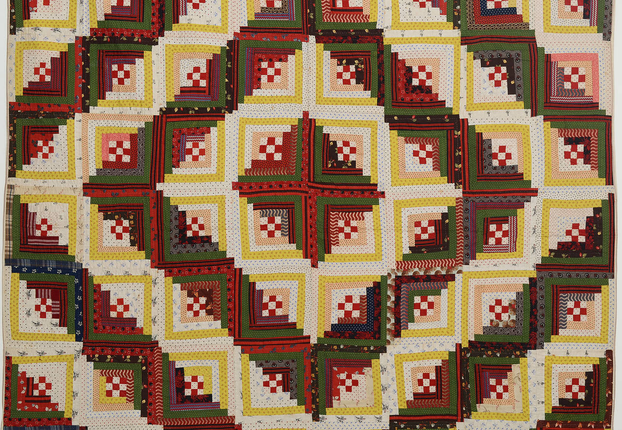 American Barnraising Log Cabin Quilt with Nine Patch Centers