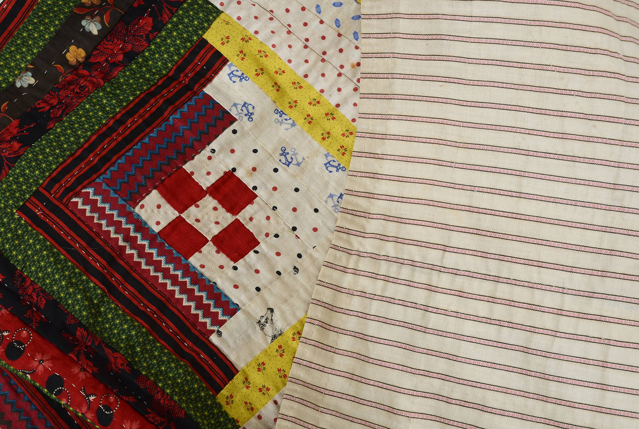 Late 19th Century Barnraising Log Cabin Quilt with Nine Patch Centers
