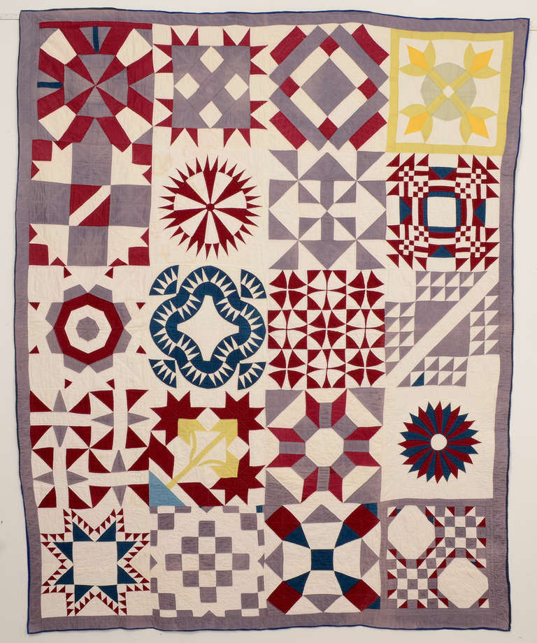 Bold Sampler Quilt displaying 20 different patterns, both traditional and original. The mauve/gray color in the quilt probably began life as a deeper tone but it is very consistent; unusual and to my eye, a very pleasing color. The quilt measures