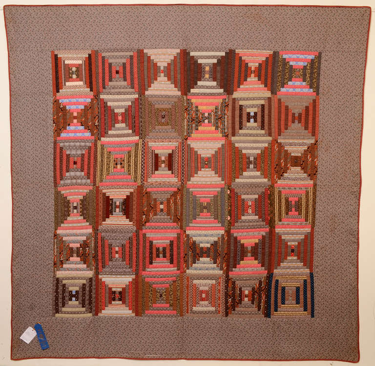 This richly colored Courthouse Steps Log Cabin quilt pattern  is beautifully colored with perfectly compatible tones of browns, reds  and deep pinks. The quilt won blue ribbon at the Greater Allentown (Pennsylvania) Fair. The person who entered the