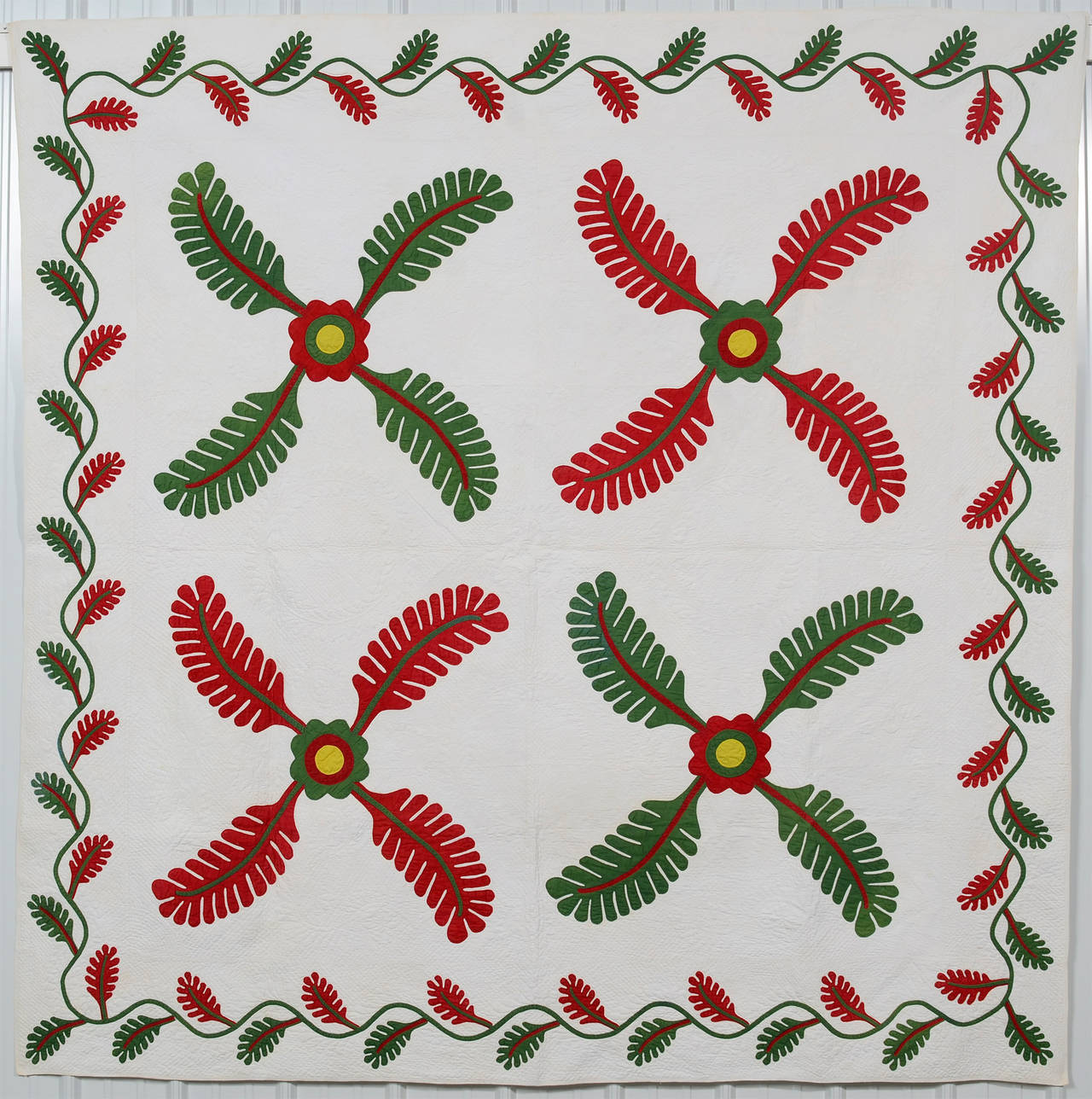 This Princess Feather (aka Prince's Feather) quilt has fewer spokes than usual. I can only assume the maker streamlined the applique in order to have more white space on which to feature her superb quilting. It is tightly quilted with arcs, diagonal